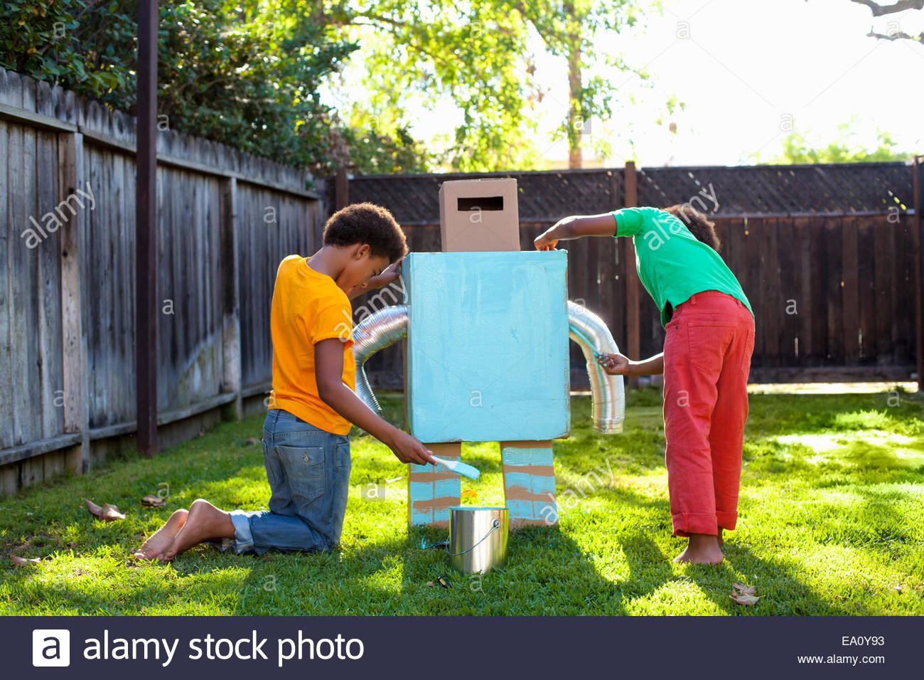 1300x956 Two Brothers Painting Home Made Robot Light Blue In Garden Stock - Two Brothers Painting