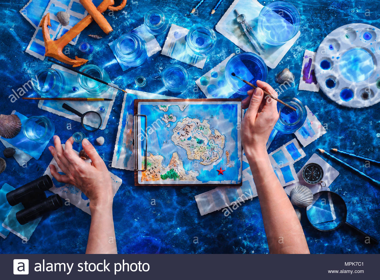 1300x957 Artist Painting A Fantasy Island Map. Underwater Still Life - Underwater Art Painting