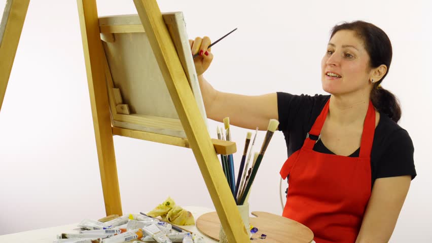 852x480 Stock Video Of Woman Artist Painting With Paintbrush. - Woman Artist Painting