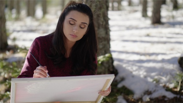590x332 Woman Painting On Canvas In Nature By Safetstudio Videohive - Woman Painting On Canvas
