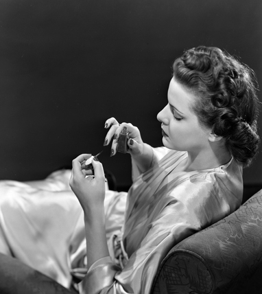382x428 Woman Sitting In A Chair Painting Her Nails, C 1940s. - Woman Sitting On Chair Painting