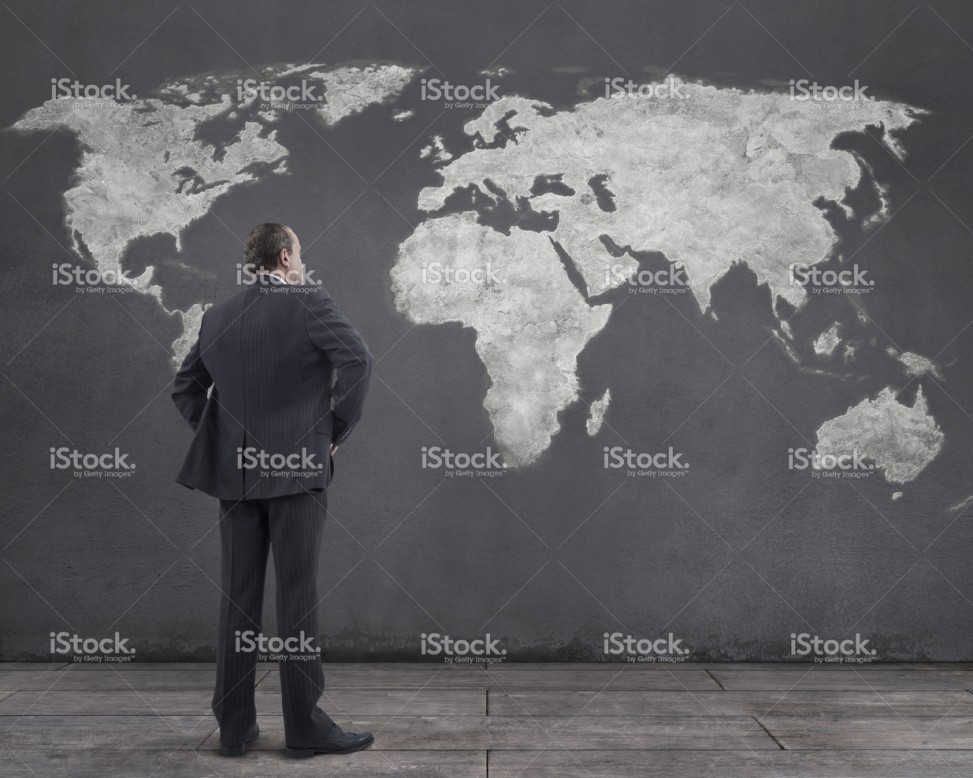 973x778 Businessman And World Map Painting On The Wall Mgkaya - World Map Painting Black And White