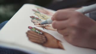 320x180 Close Up Of A Hand As An Artist Begins To Sketch On A Blank Canvas - Bright Sketch