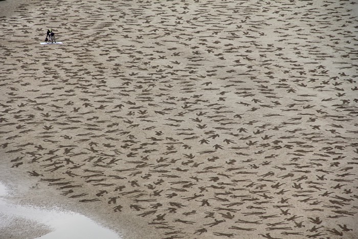 700x467 9,000 Fallen Soldiers Etched Into The Sand On Normandy Beach To - Fallen Soldier Sketch