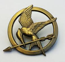 230x219 Mockingjay Pin The Hunger Games Wiki Fandom Powered By Wikia - Mockingjay Pin Sketch