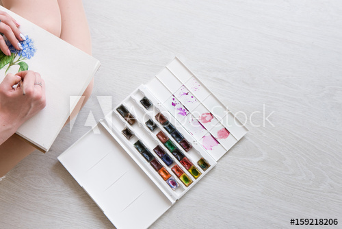 500x334 Painter Is Drawing Watercolor Flower Sketch. Colorful Artwork Of - Paint Palette Sketch