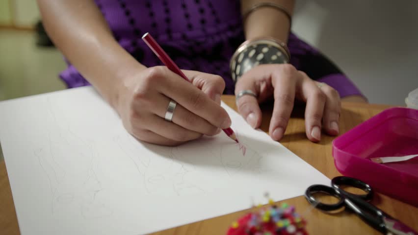 852x480 Female Fashion Designers Drawing Sketches Stock Footage Video (100 - Stock Sketches